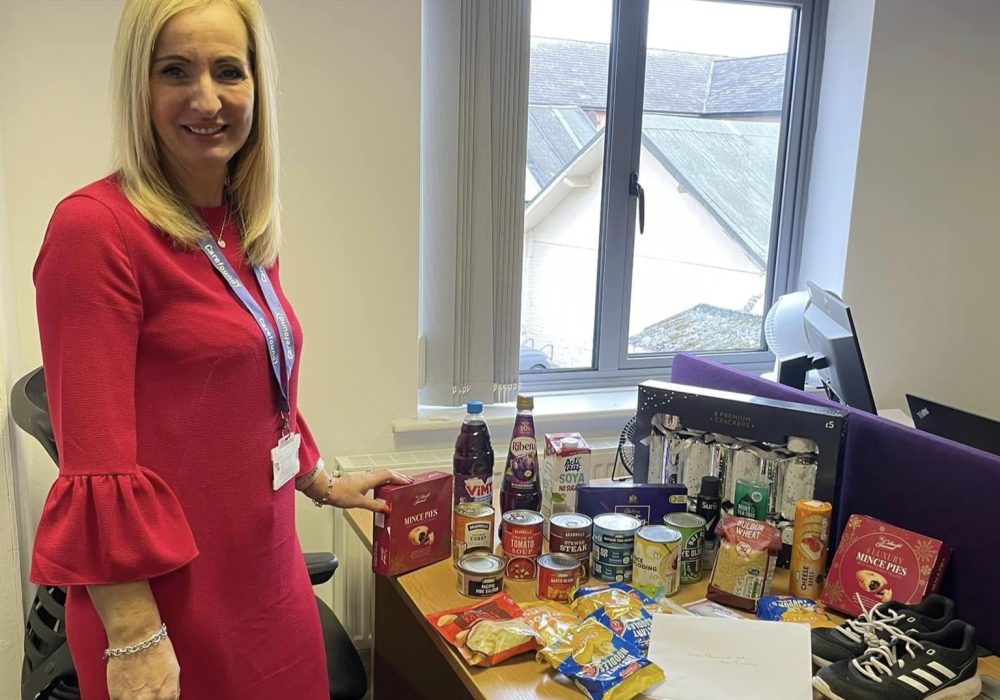 Shelley Taylor collecting donations from staff at Carefound Home Care in West Bridgford