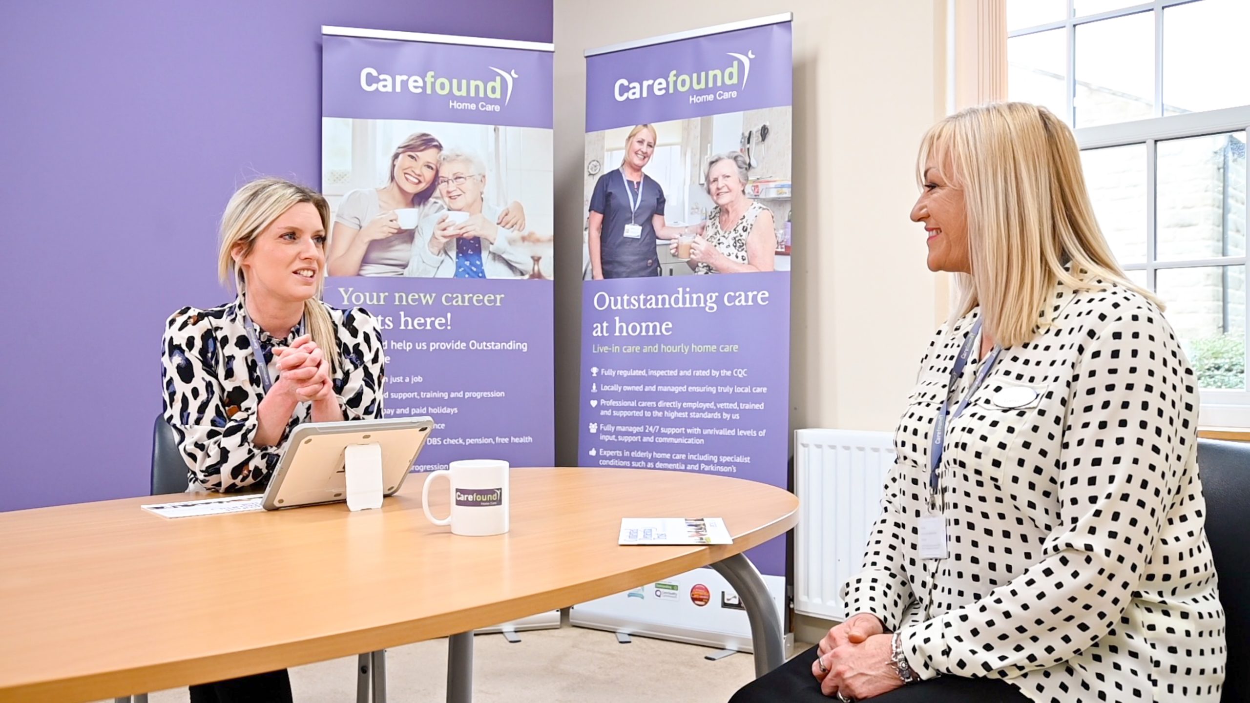 Carer discussing her career path with manager