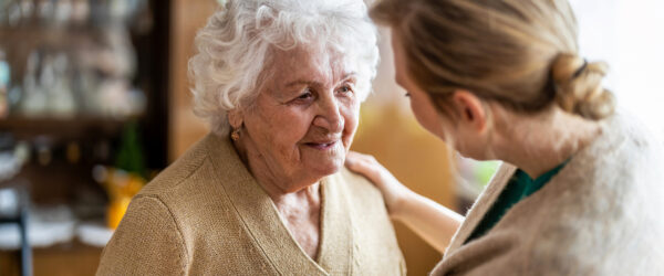 Carer talking to senior lady
