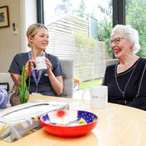 carer-catting-with-elderly-lady Carer chatting with elderly lady