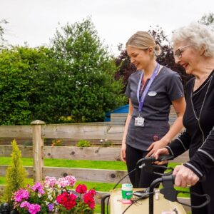 carer-with-elderly-lady-in-garden Carer with elderly lady in garden