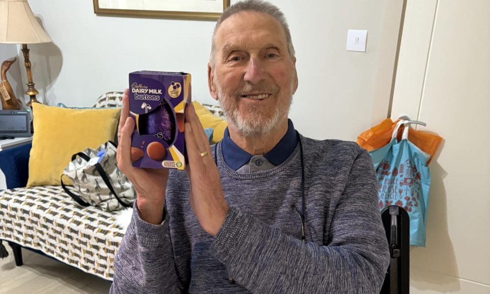 Elderly gentleman holding Easter egg in Harrogate