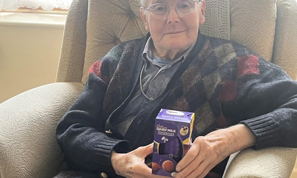 Elderly gentleman with Easter egg in Wilmslow