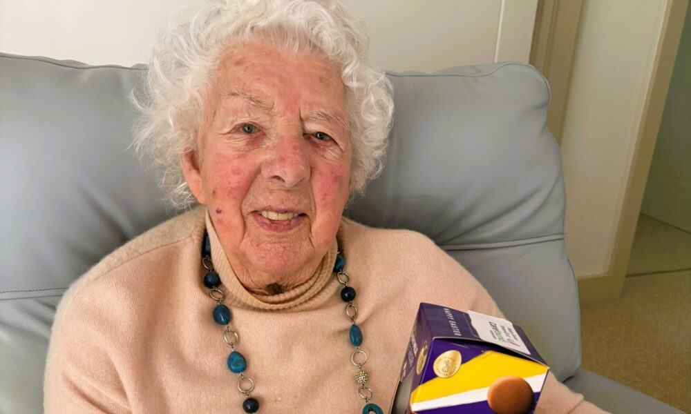 Harrogate Easter Celebrations 2026 Elderly lady receiving Easter egg in Harrogate